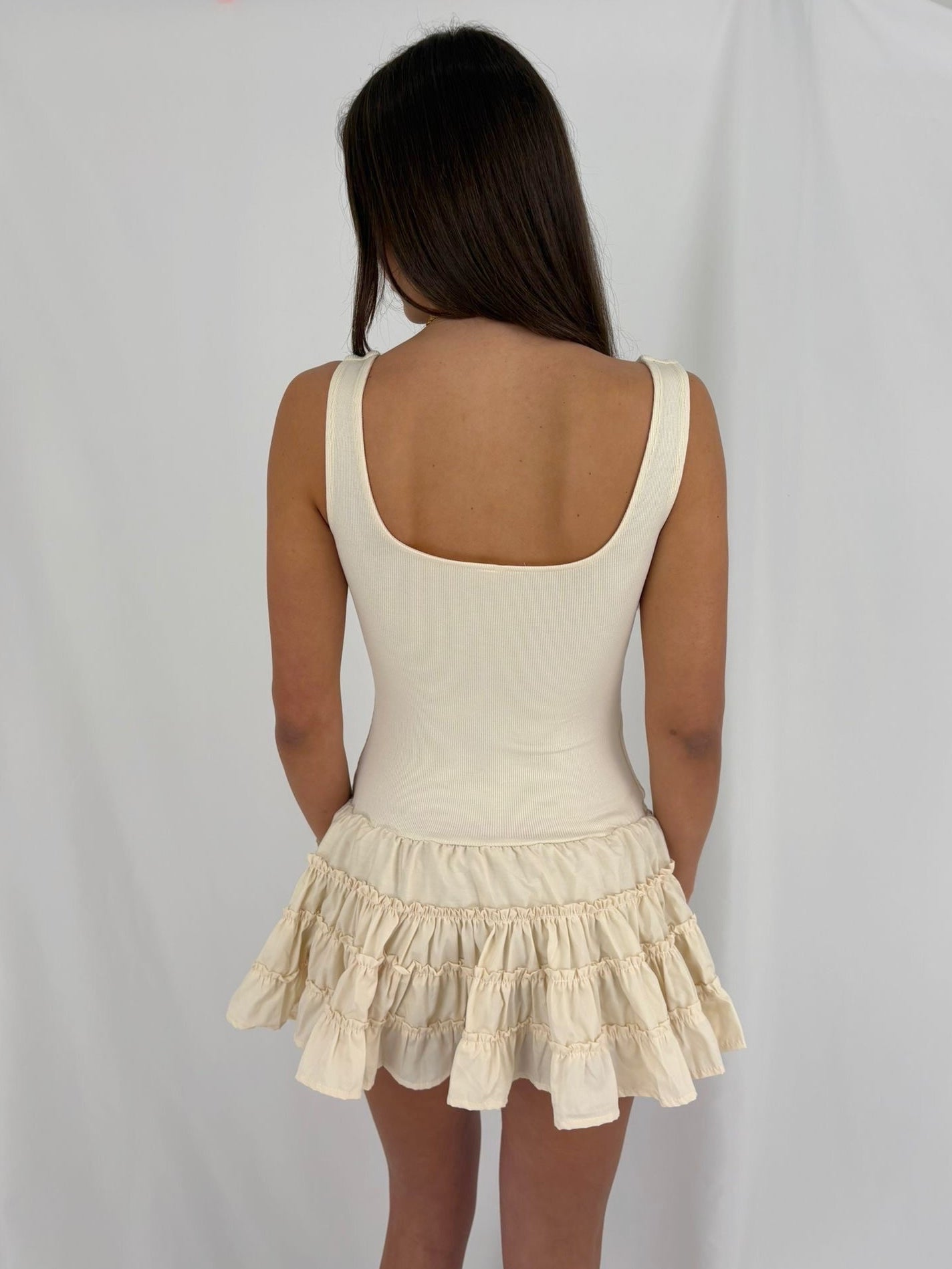 The Ruffle Skirt Mini Dress in Beige